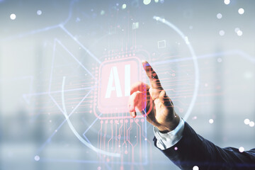 Double exposure of businessman hand working with creative artificial Intelligence abbreviation hologram on blurred office background. Future technology and AI concept