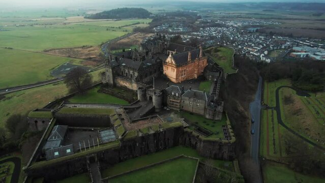 Stirling Castle, popular tourist attraction. Scottish Stronghold on top of a hill, 4K aerial footage