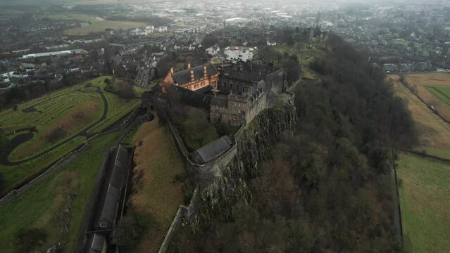 Aerial view of Stirling Castle on a cloudy day. Large Scottish fortress surrounded by cliffs