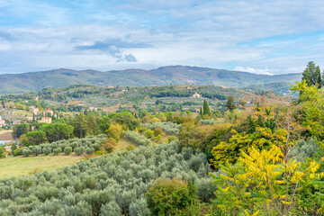 Tuscany Italy countryside with mountains and a beautiful sky