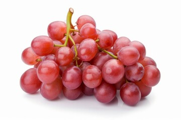 Fototapeta premium A bunch of red grapes, appearing translucent in a closeup, on a white surface, suggesting wine.