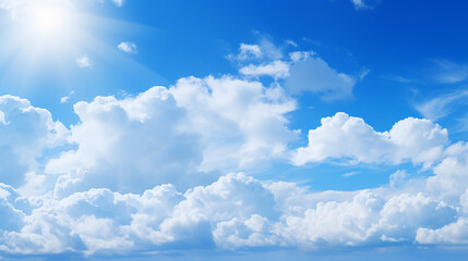 Naklejka na ściany i meble blue sky with bright sunlight and white clouds background