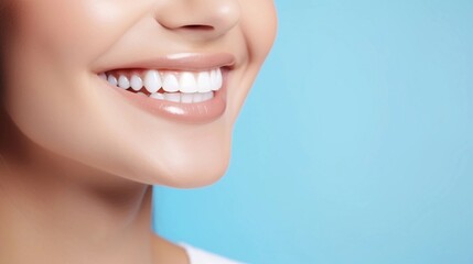 Versatile photorealistic banner with a girl smiling with beautiful teeth close up on a bright blue plain background, close up of her face with space to insert text