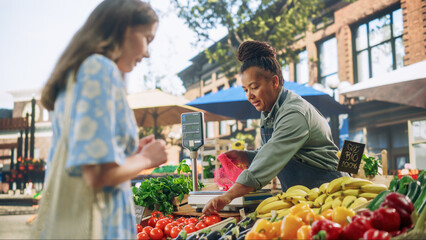 Middle Aged Black Female Running a Small Business on a Farmers Market, Selling Organic Fruits and...