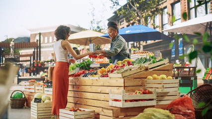 Young Beautiful Customer Shopping for Fresh Organic Vegetables for a Fresh Salad with Tomatoes and...
