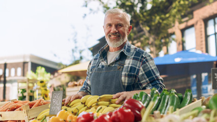 Portrait of a Man Managing a Street Vendor Food Stand with Fresh Natural Agricultural Products....