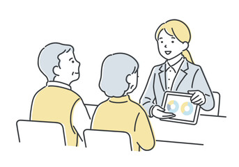 シニア夫婦に案内をする営業担当者