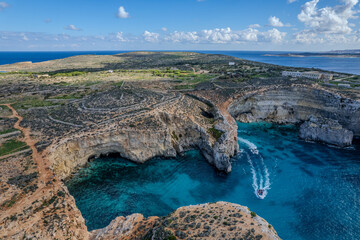 Aerial drone beautiful sunny view of Blue Lagoon in Comino Island, Gozo Island, Malta