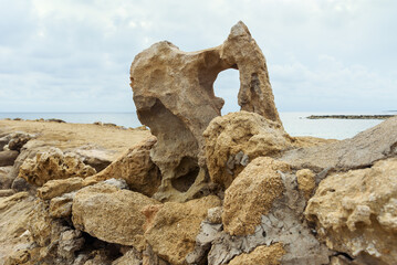 Mediterranean coast with a stone wall. - 710336137