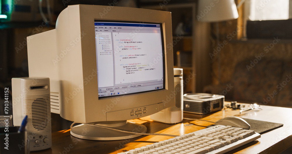 Leinwandbilder close up shot of old desktop computer on work desk of software engineer in retro garage. dated pc ha