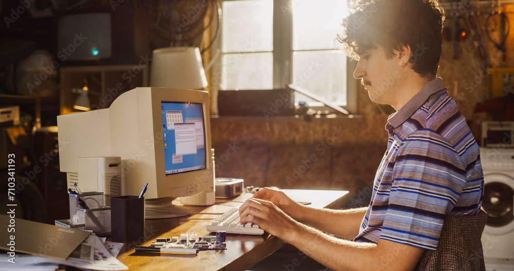 Poster Caucasian Male Hardware Engineer Programming On Old Desktop Computer In Retro Garage. Experienced Software Developer Writing Code For New Innovative Operating System In Nineties.