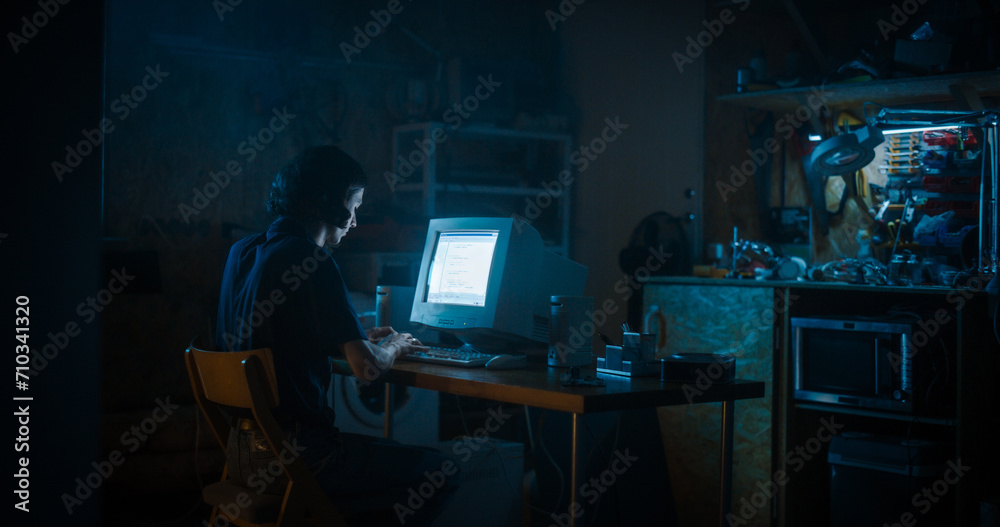 Poster Caucasian Male Programmer Using Old Desktop Computer In Retro Garage Late At Night. White Hat Hacker Searching For Software Vulnerabilities, Coding Cyber Security System, Protecting Data In Nineties.