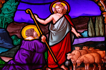 Saint Leonard church.  Stained glass. Saint Peter and Jesus.  Arbois. France.