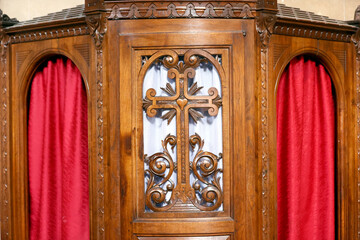 Saint Leonard church. Confessional for the confessions of penitents. Sacrament of reconciliation....