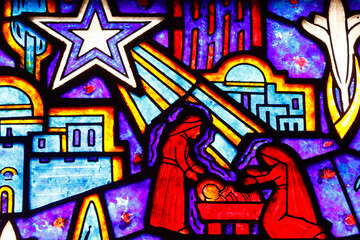 Saint Helier church. Stained glass.  Nativity of Jesus or birth of Christ. The nativity is the...
