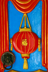 Mongkol Serei Kien Khleang Pagoda.  Door decorated with a red lantern. Phnom Penh; Cambodia.