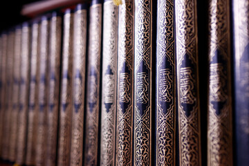 Row of Holy Quran ( Kuran ) books in a mosque. Islamic symbol. Phnom Penh. Cambodia.