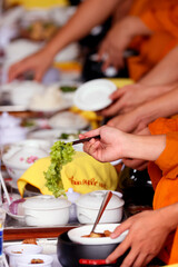 Phuoc Hue buddhist pagoda.  Monks at buddhist ceremony in the main  hall. Vegetarian meal.  Vietnam.