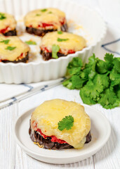 mini eggplant pizzas with tomato sauce and cheese