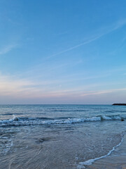 
It is a seascape with waves crashing.