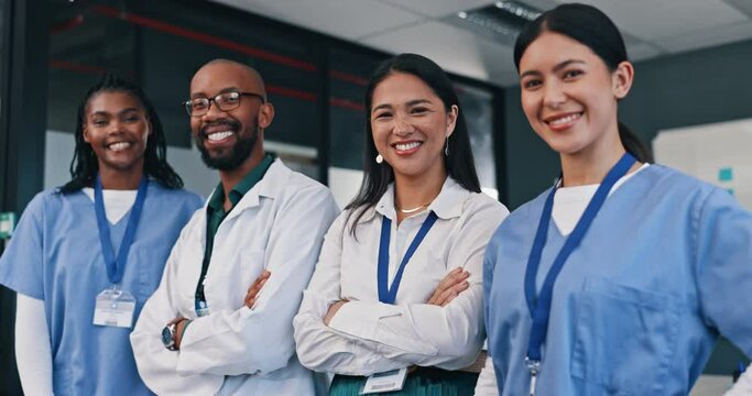 Happy, doctors and group with arms crossed in hospital with confidence in medical goals or mission. Healthcare, team and portrait of people in clinic working in medicare with pride and diversity