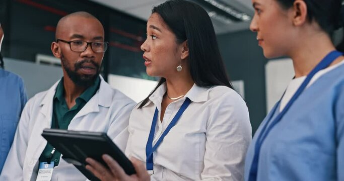 Discussion, tablet or team of doctors in meeting planning a surgery strategy in collaboration in hospital. Talking, healthcare workers or nurses speaking of online news report, feedback or research - Powered by Adobe