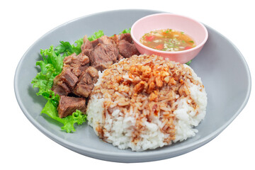 Stewed beef with rice on plate