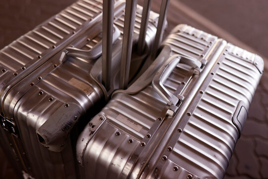 Silver metal suitcases at airport.  Vacation  and travil concept.