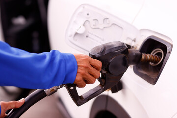 Gas station. Driver at a filling station buying, petrol, gasoline, fuel.