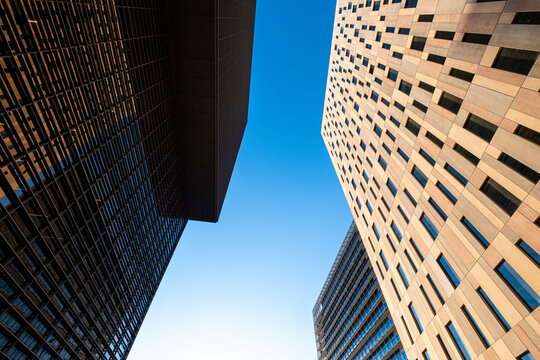 Low angle view of modern office buildings in the financial area of Poblenou in the city of Barcelona in Catalonia in Spain