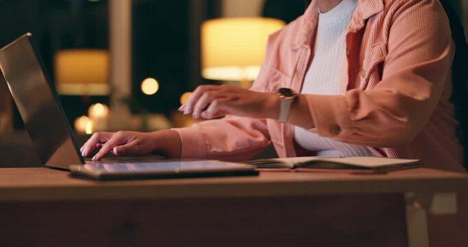 Hands, writing notes and laptop at night for home education, e learning ideas and research goals. Student or creative person typing and studying on a computer, planning and brainstorming in notebook