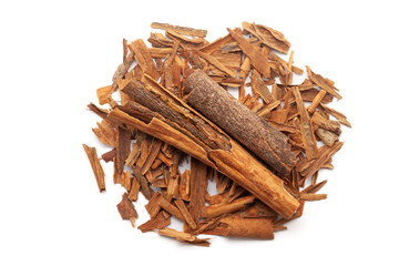 Top view of Dry organic Cinnamon sticks (Cinnamomum verum) isolated on a white background.