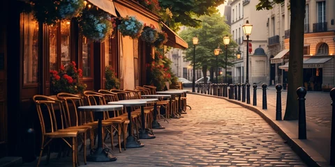 Poster Narrow street with cafe tables © xartproduction