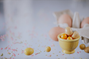 Easter background with colored sugar eggs and copy space