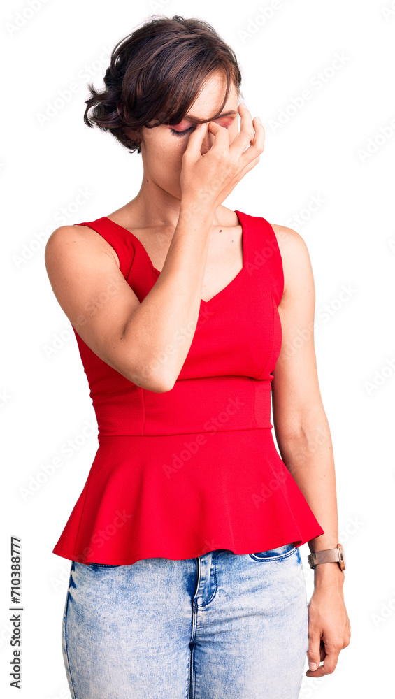 Sticker Beautiful young woman with short hair wearing casual style with sleeveless shirt tired rubbing nose and eyes feeling fatigue and headache. stress and frustration concept.