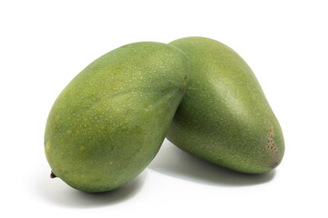 Two fresh organic green mango delicious fruit side view isolated on white background clipping path