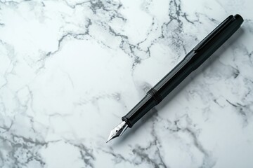 Sleek black fountain pen, isolated on a white marble background