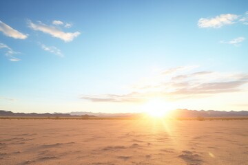 Fototapeta na wymiar sun setting behind desert plateau