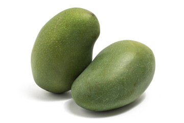 Two fresh organic green mango delicious fruit side view isolated on white background clipping path