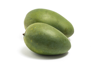 Two fresh organic green mango delicious fruit side view isolated on white background clipping path
