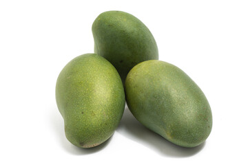 Three fresh organic green mango delicious fruit side view isolated on white background clipping path