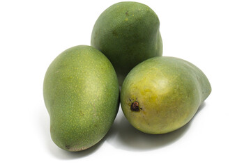Three fresh organic green mango delicious fruit side view isolated on white background clipping path