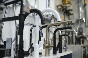 Rows of new faucets in plumbing shop