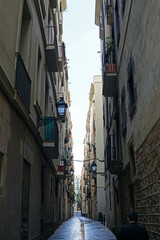 Exterior European architecture and Spanish decoration design of narrow alley and walking street building in center of Barcelona old town city- Barcelona, Spain
