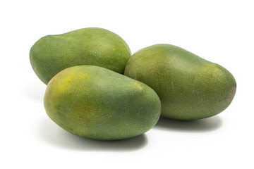 Three fresh organic green mango delicious fruit side view isolated on white background clipping path