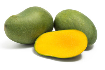 Half cut and two whole fresh organic green mango delicious fruit side view isolated on white background clipping path