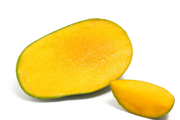 Half cut and sliced fresh organic green mango delicious fruit side view isolated on white background clipping path