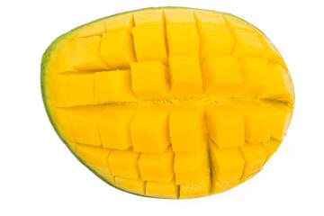 Cut into cubes fresh organic green mango delicious fruit flat lay isolated on white background clipping path
