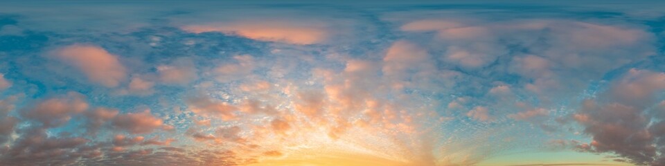 360 panorama of glowing sunset sky with bright pink Cumulus clouds. HDR 360 seamless spherical panorama. Full zenith or sky dome sky replacement for aerial drone panoramas. Climate and weather change.