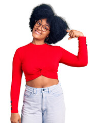 Young african american girl wearing casual clothes and glasses smiling pointing to head with one finger, great idea or thought, good memory